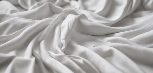 Obraz premium White fabric texture with visible creases and wrinkles, background, waves, linen, soft