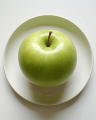 Green Apple on White Plate
