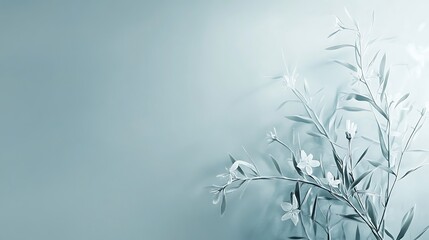 Naklejka premium Delicate White Flowers and Leafy Branches Against a Soft Blue Background