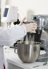 scientist woman is  analyzing food in the laboratory