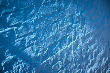 Textured Blue Brick Wall in Urban Setting Eye-Level View