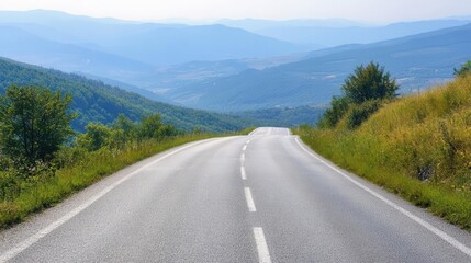 long, empty mountain road stretching towards the horizon on a summer day, partially shrouded in a mystical light mist, inviting viewers to imagine adventures ahead