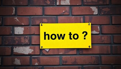 Fototapeta premium Warning sign posted on a brick wall. The sign is bright yellow with bold black text that reads how to