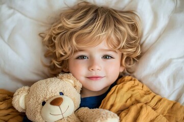 Baby Sleep Day. Sleeping 3-year-old toddler with soft blonde curls, gently hugging a plush teddy bear in both arms.