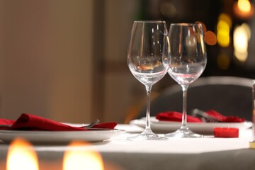 Table setting for romantic dinner in restaurant