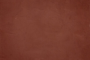 Close-up texture of an old red wall.