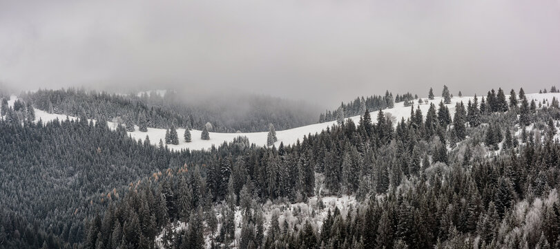 Winter landscape in Ciuc mountains, a mid-high range of mountains of Harghita County in Transylvania, Romania. Two shots stitch high-resolution panorama.