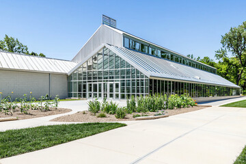 Fototapeta premium Urban sustainability center with modular greenhouse design
