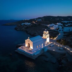 Fototapeta premium Aerial view of Paraportiani and Little Venice, Mykonos, at night.