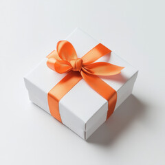Obraz premium White Gift Box with Orange Ribbon: Minimalist Present