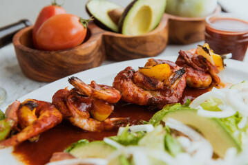 Cajun plated marinated shrimp. restaurant service