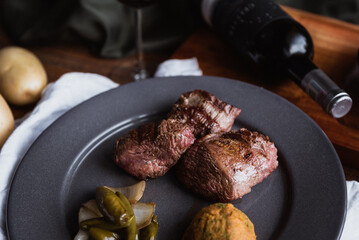 close up a piece of meat with its respective garnishes