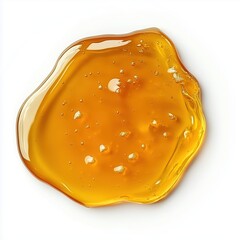 Golden jelly droplet smear isolated on white background close up photo