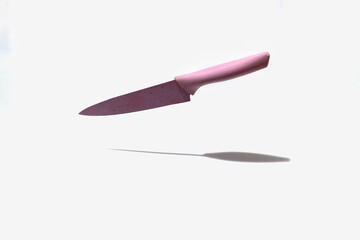 pink kitchen knife, isolated on white background