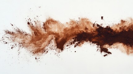 Fine brown powder explodes against a white background, creating a vibrant cloud of color reminiscent of the vibrant hues of Holi paint.
