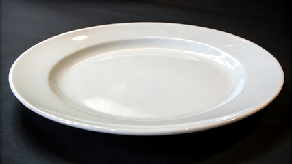 White Round Plate on a Dark Background