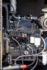 Fototapeta premium Powerful diesel engine showcased in industrial setting with intricate components
