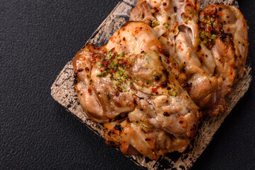 Grilled boneless chicken thigh with salt, spices and herbs