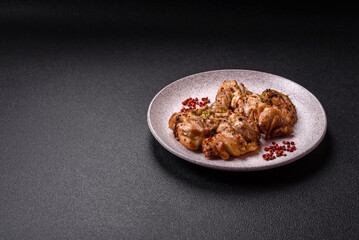 Grilled boneless chicken thigh with salt, spices and herbs