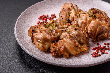 Grilled boneless chicken thigh with salt, spices and herbs