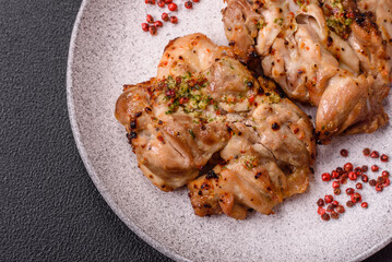 Grilled boneless chicken thigh with salt, spices and herbs