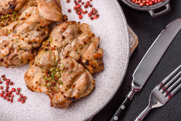 Grilled boneless chicken thigh with salt, spices and herbs