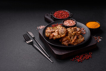 Grilled boneless chicken thigh with salt, spices and herbs