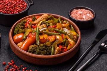 Mix of vegetables corn, carrots, peppers, broccoli, onions in teriyaki sauce