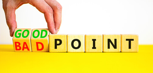 Good or bad point symbol. Concept words Good point Bad point on beautiful wooden blocks. Beautiful yellow table white background. Businessman hand. Business good bad point concept. Copy space