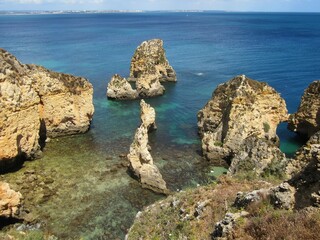 Bay of rock formations along the coast of Lagos, Portugal