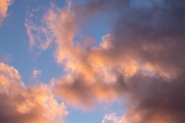 Beautiful cloudscape with orange and pink colors during sunset