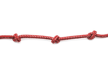 Rope with a knots on white background