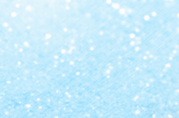 Blue glittering christmas lights. Blurred abstract background