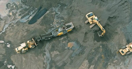 Excavators conveyor system move materials at construction site under bright daylight at stone quarry