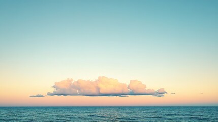Serene sea horizon with one cloud at sunset.