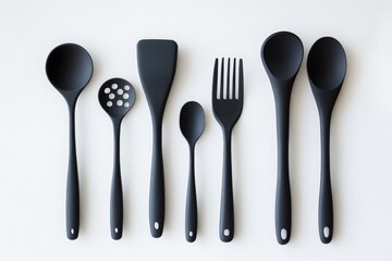 Diverse Collection of Kitchenware Cooking Tools and Utensils Arranged in a Flat Lay Layout on a Culinary Background