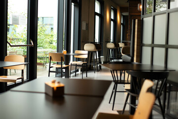 Cozy wooden restaurant interior, copy room. Comfortable modern dining room, modern background design