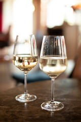 Two glasses of cold white wine