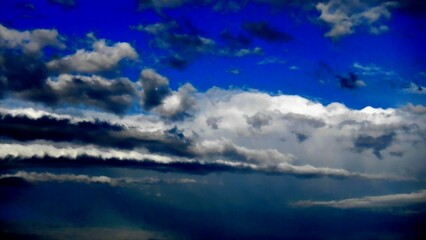 Fototapeta premium Blue sky and white and grey clouds Stratocumulus Volutus - abstract sky background with natural pattern of clouds. Topics: weather, meteorology, abstraction, nature, wallpaper, climate, air space