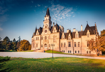 Majestic autumn view of Budmerice Castle. Attractive evening cityscape of Budmerice village,...