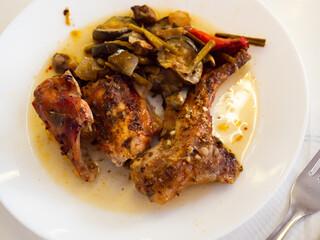 Roasted rabbit served with potato and vegetables for dinner