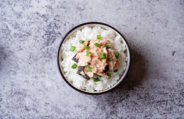 Rice bowl with salmon flakes, nori and scallion
