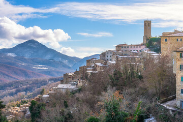 Snow in Tuscany, Castelnuovo Val di Cecina village, winter panorama. Pisa, Italy