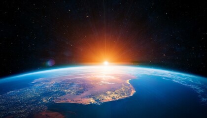 Obraz premium Sunrise over Earth from space. A breathtaking view of our planet.