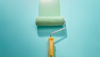 Obraz premium Roller applying paint to wall, scene of smooth rolling on wall