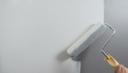 Roller applying paint to wall, scene of smooth rolling on wall