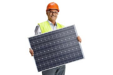 Mature male engineer holding a solar panel