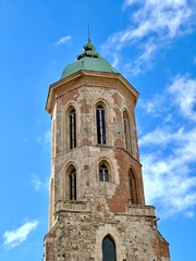 ancient stone tower with green dome in budapest
