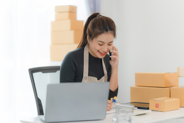 Smiling Woman Small Business Owner on Phone Call 