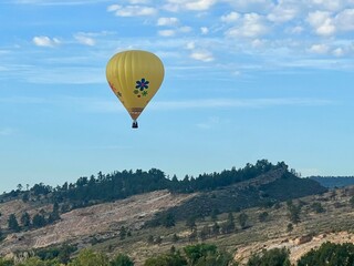 hot air balloon over the mountain